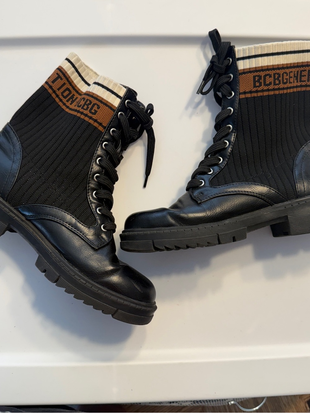 BCBG Black Knit-Shaft Combat Boots with Brown and Cream Trim Womens 6.5
